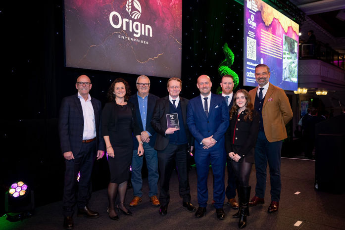 8 individuals from Ground Control and The Parks Trust stage recieving the 2025 BALI Award